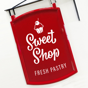 Vinyl graphics applied to shop swing sign